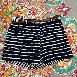 navy blue shorts with white stripes